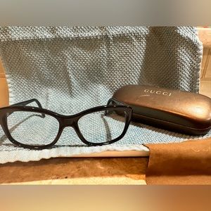 GUCCI black rimmed women’s eye glasses. Come with case & cleaning cloth.